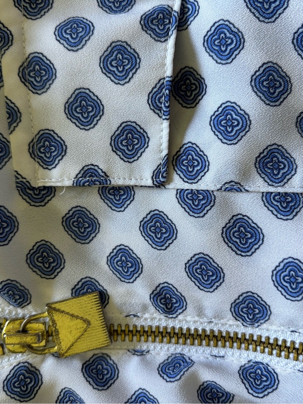 MICHAEL Michael Kors White Top with Blue Medallion Pattern and Gold Zip
